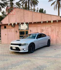 دۆج چارجەر
